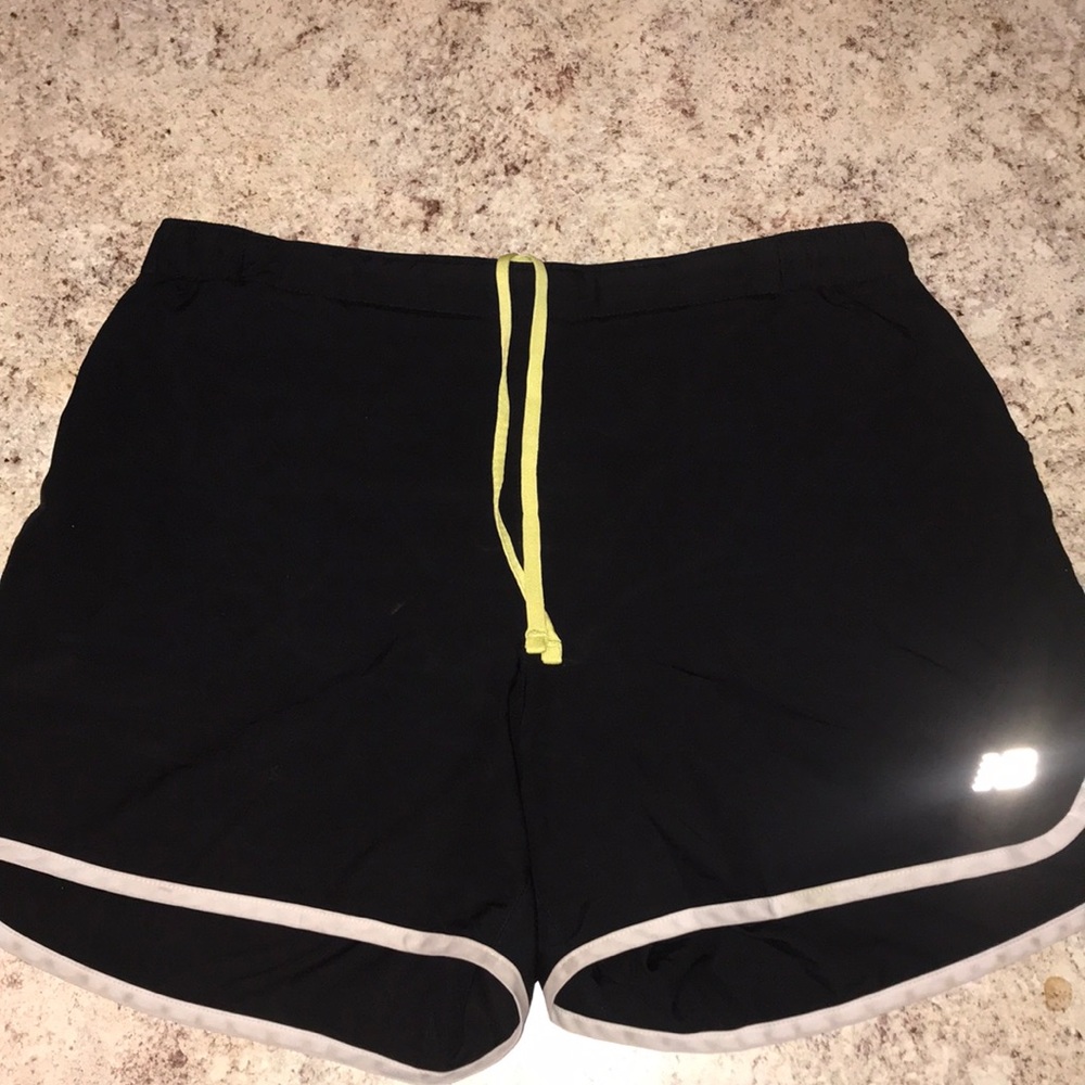 New Balance reflective running shorts